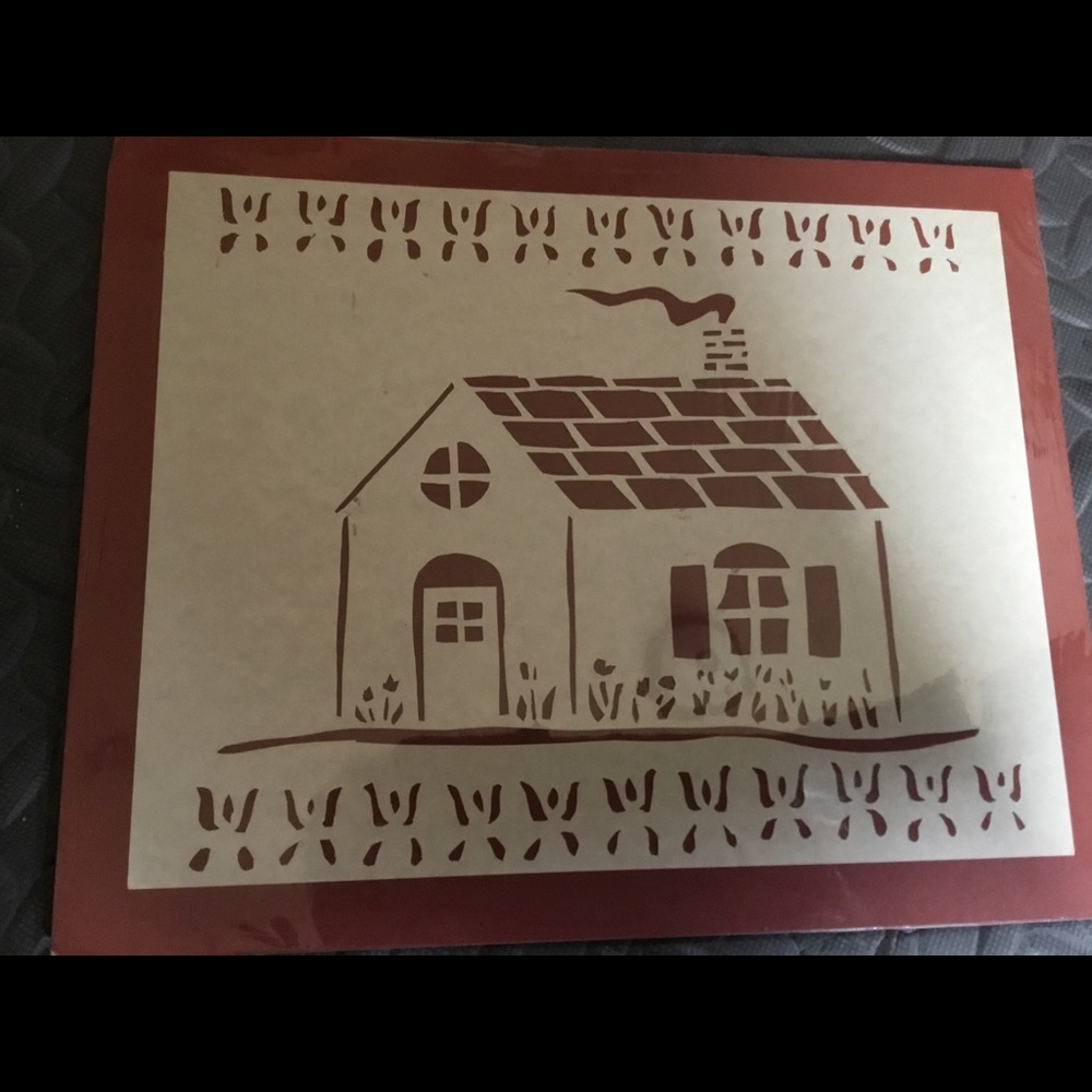 Hand cut cottage scherenschnitte rust background